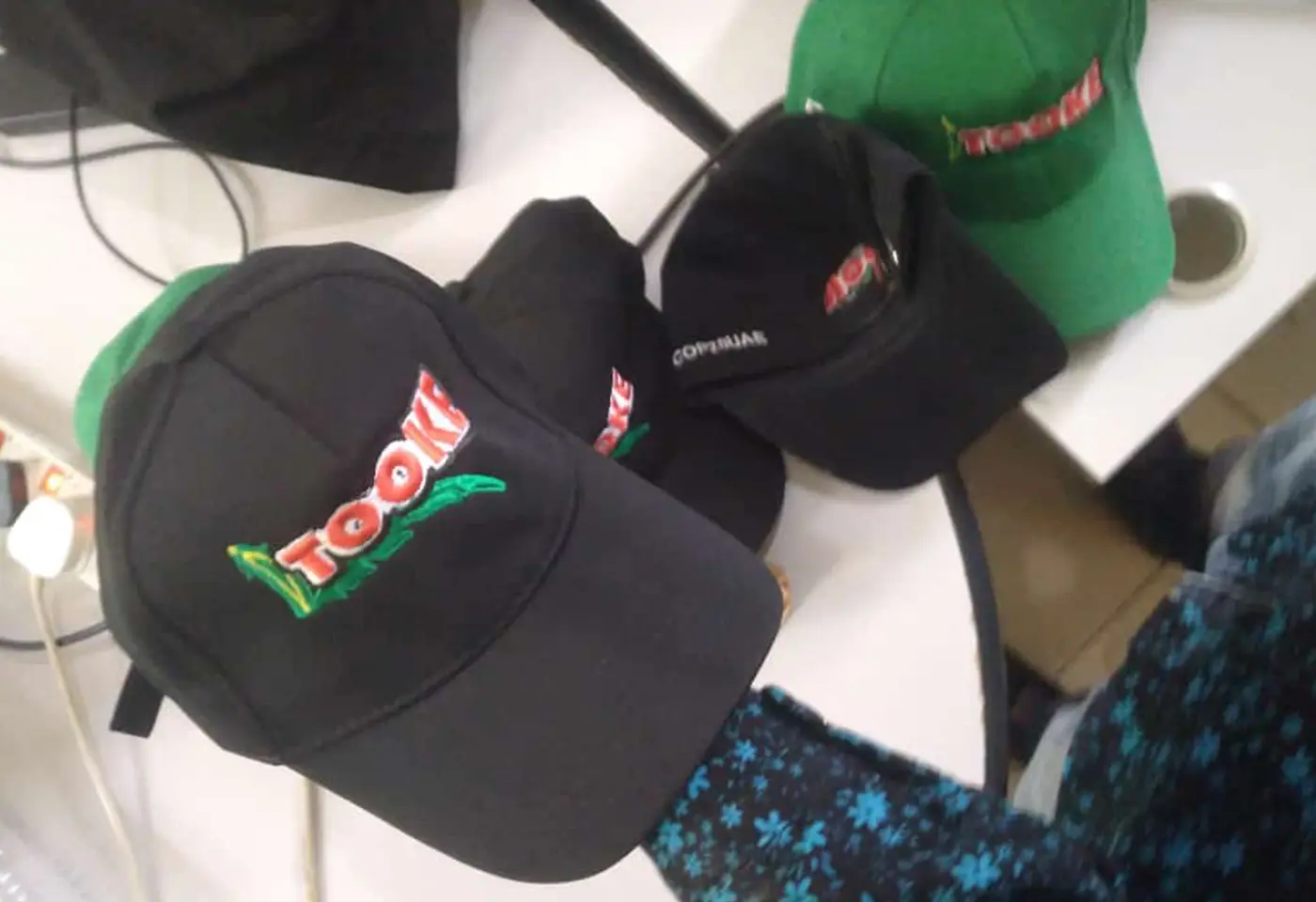 Embroidered Caps by Kamog Artistry (U) Ltd
