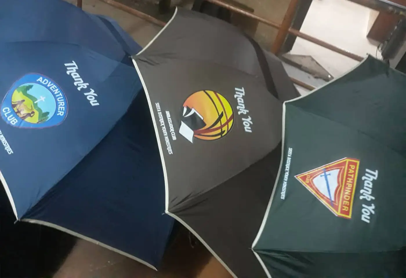 Branded Corporate Umbrellas Big with DTF Printing by Kamog Artistry (U) Ltd
