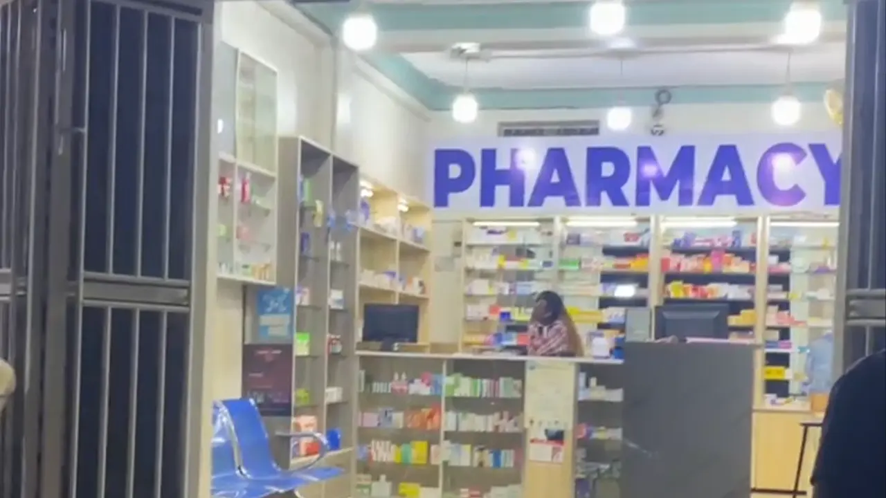 Ability Pharmacy interior branding with counter and wall signage by Kamog Artistry (U) Ltd