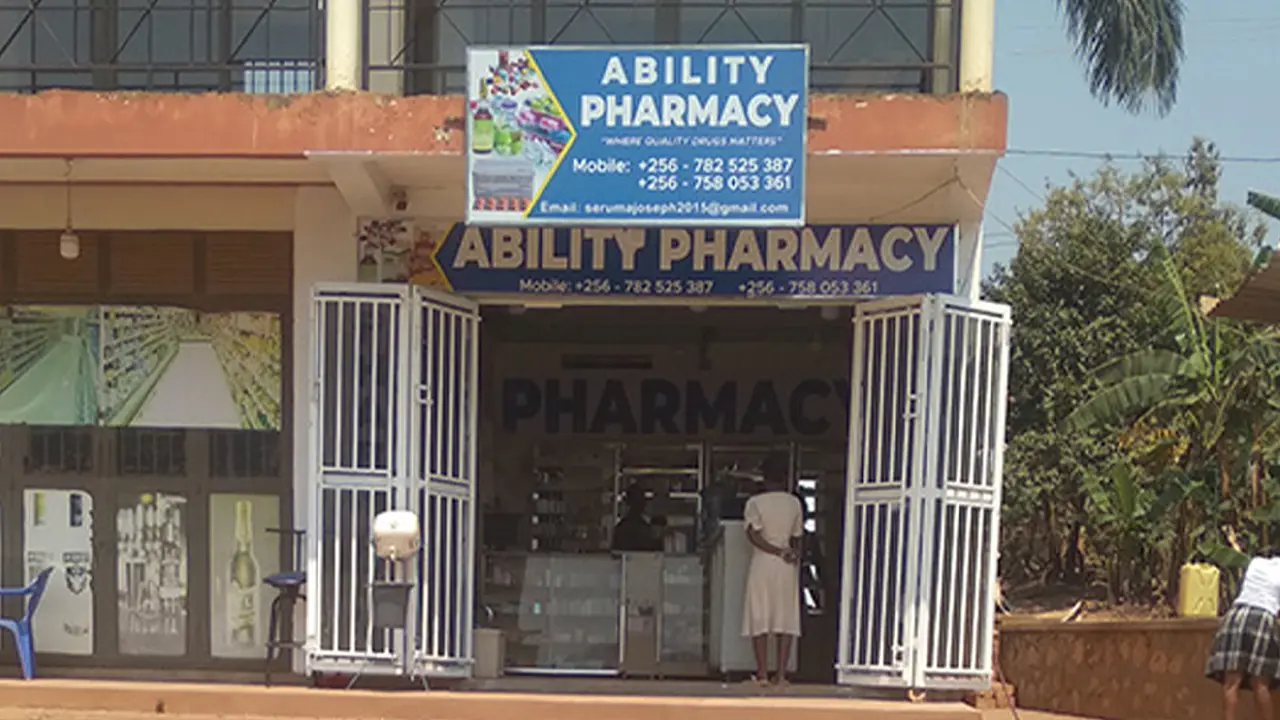 First light box signage installation stage for Ability Pharmacy storefront