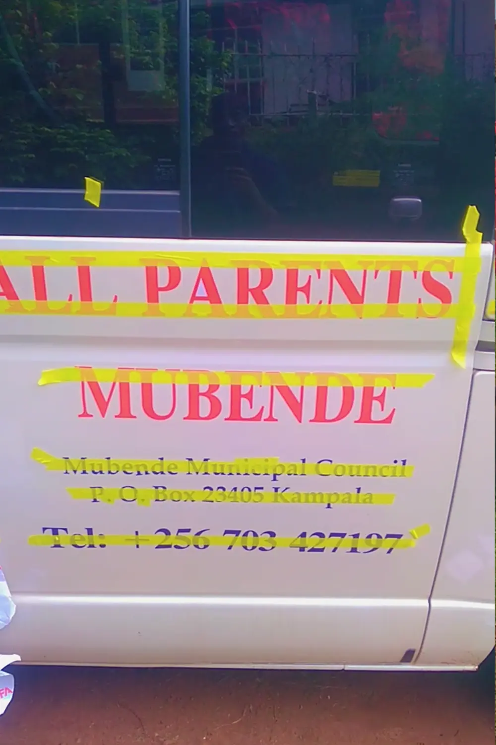 Masked plotted graphics installation on school van side panel