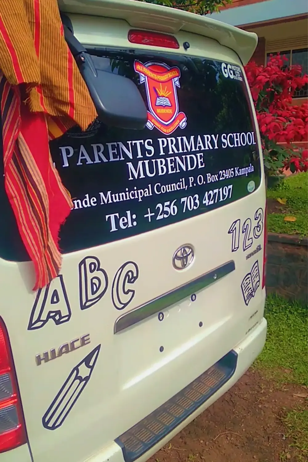 Rear view school transport vehicle branding installation
