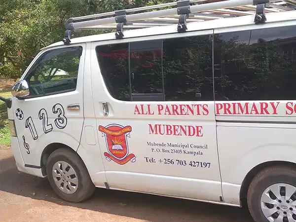 All Parents Primary School Mubende school van branding with logo redrawing, glossy laminated vinyl plotting and vehicle graphics installation by Kamog Artistry (U) Ltd