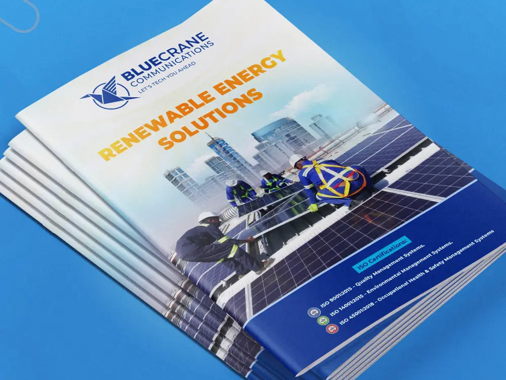 Stacked company profile booklets for Blue Crane Communications Ltd by Kamog Artistry (U) Ltd