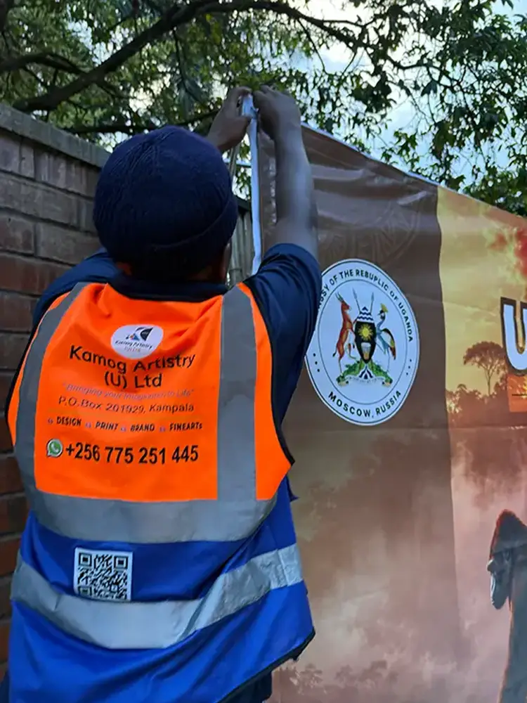 Close view of the Embassy of the Republic of Uganda Moscow identity panel during backdrop installation