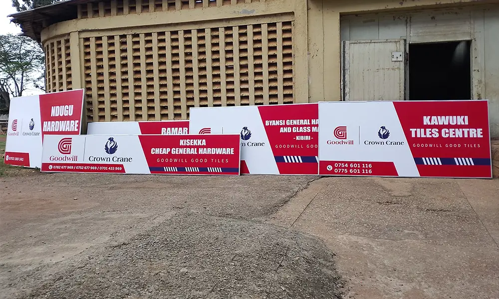 Completed aluminium-framed Goodwill and Crown Crane PVC hardware signage in varying formats