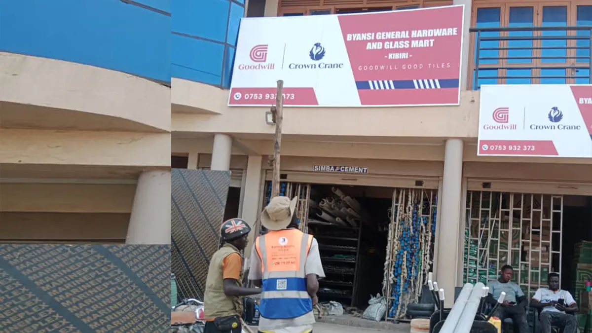 Team checking the installed hardware signage  at Byansi • Kibiri for the Goodwill and Crown Crane rollout