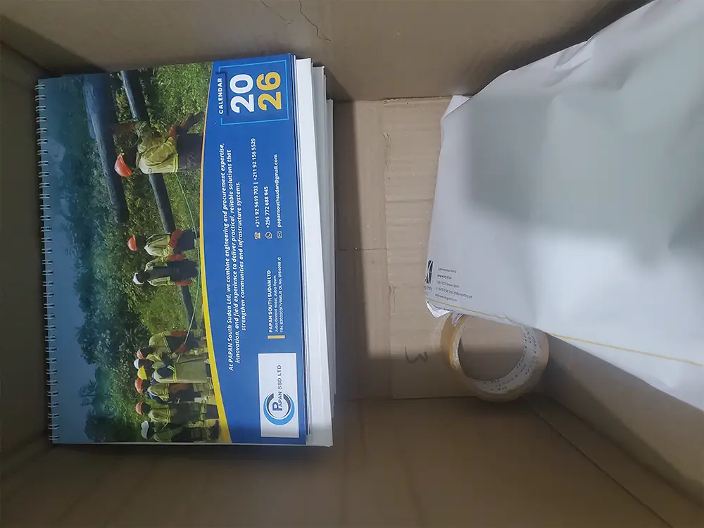 Packaged PAPAN SSD table calendars prepared for transport