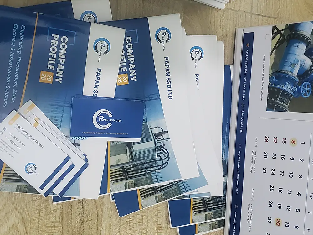 PAPAN SSD company profile, table calendars and business cards design printing and delivery project South Sudan by Kamog Artistry (U) Ltd