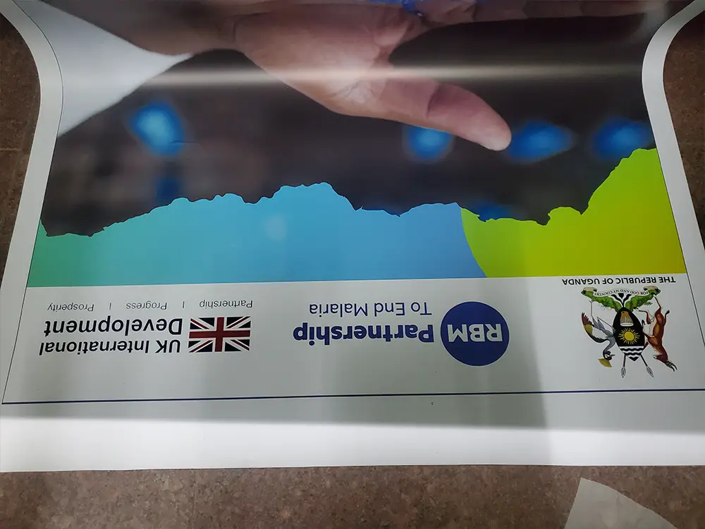 Behind the scenes printing and finishing from RBM Partnership to End Malaria event branding case study by Kamog Artistry (U) Ltd