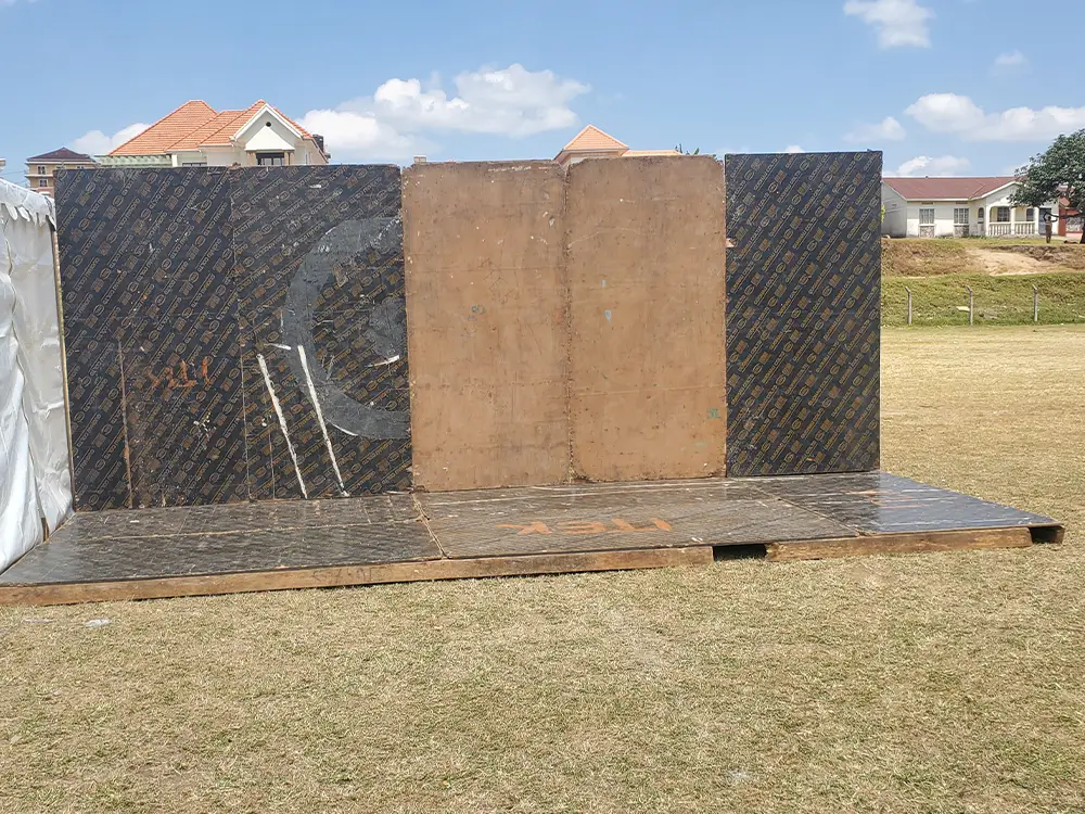 Media wall structure before branding — Outdoor photo backdrop stand prepared before the sponsor PVC was fitted.