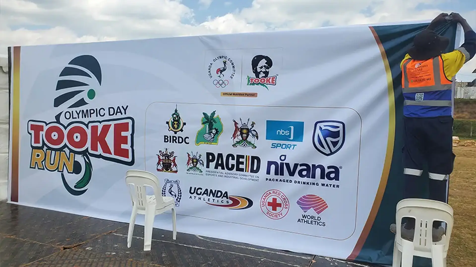 Tooke Run 2026 event branding, large format printing and field branding case study in Bushenyi