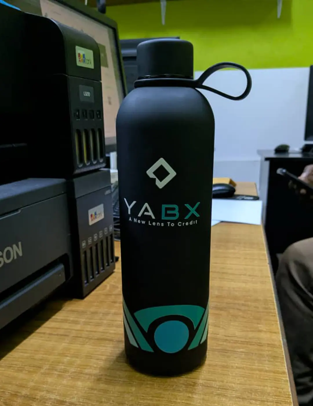Branded water bottle custom merchandise for YABX corporate gifts in Kampala