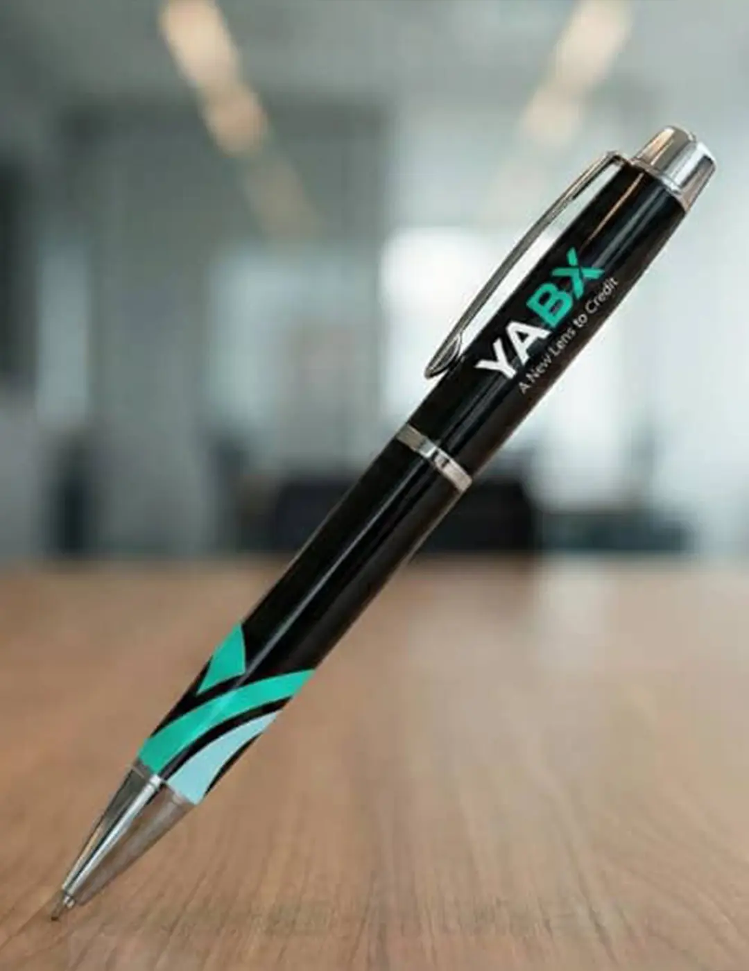 Branded logo pen custom corporate merchandise design for YABX by Kamog Artistry (U) Ltd