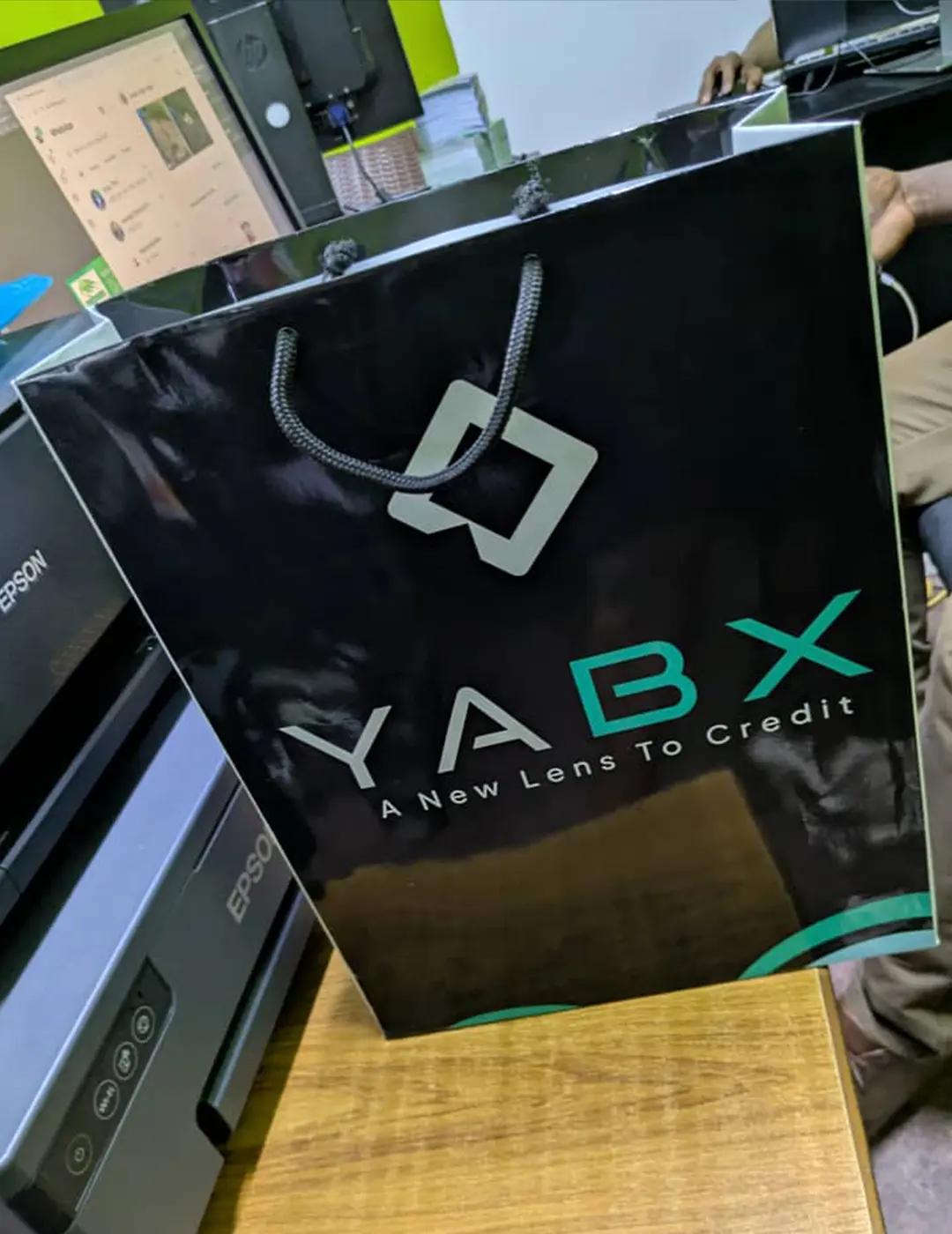 Custom branded gift bag corporate packaging merchandise for YABX by Kamog Artistry (U) Ltd