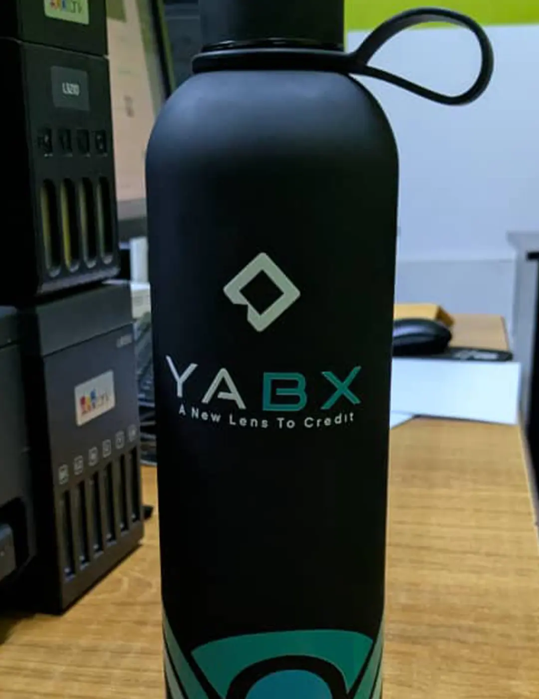 Branded water bottle logo corporate merchandise closeup for YABX by Kamog Artistry (U) Ltd