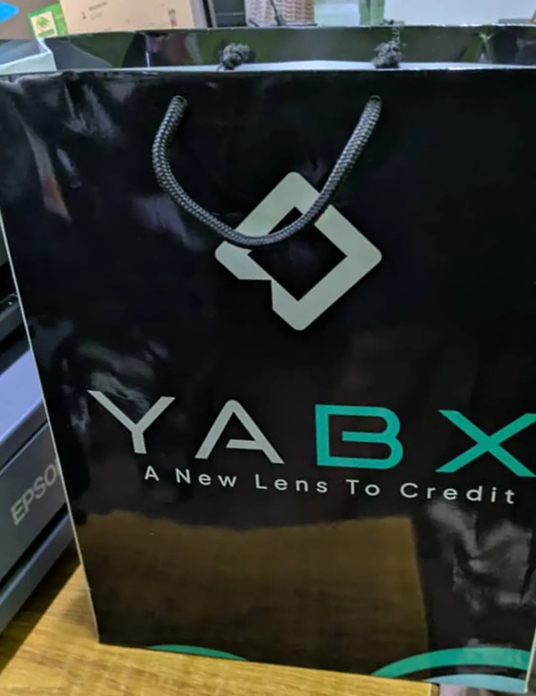 Branded gift bag logo corporate packaging closeup for YABX by Kamog Artistry (U) Ltd