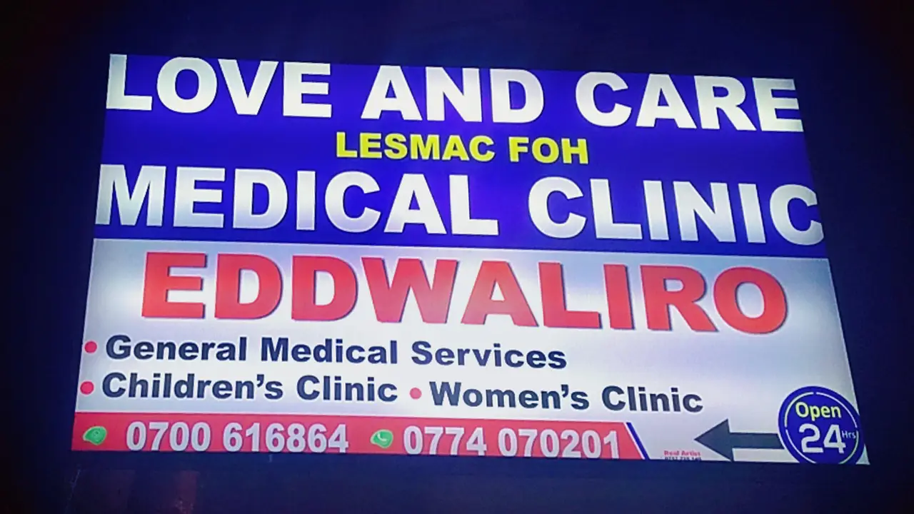 Illuminated lightbox sign example in Uganda showing bright storefront visibility for a pharmacy or retail business