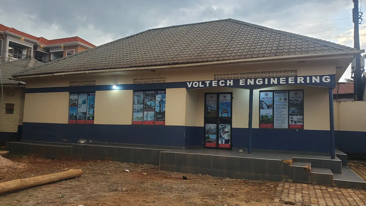 Corporate branding execution for a Uganda business showing clean identity application across materials