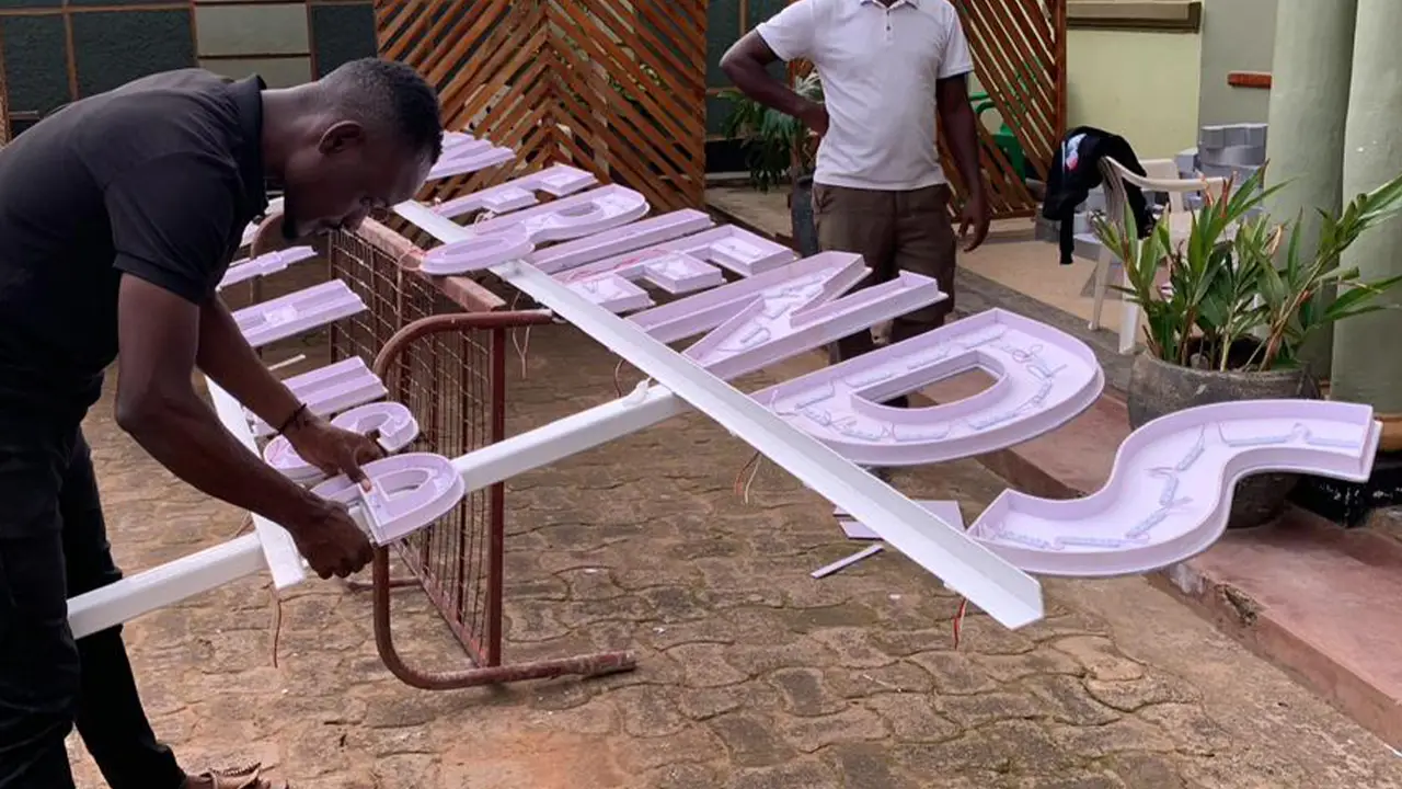 Lightbox and 3D signage example in Uganda showing illuminated letters and premium business frontage branding