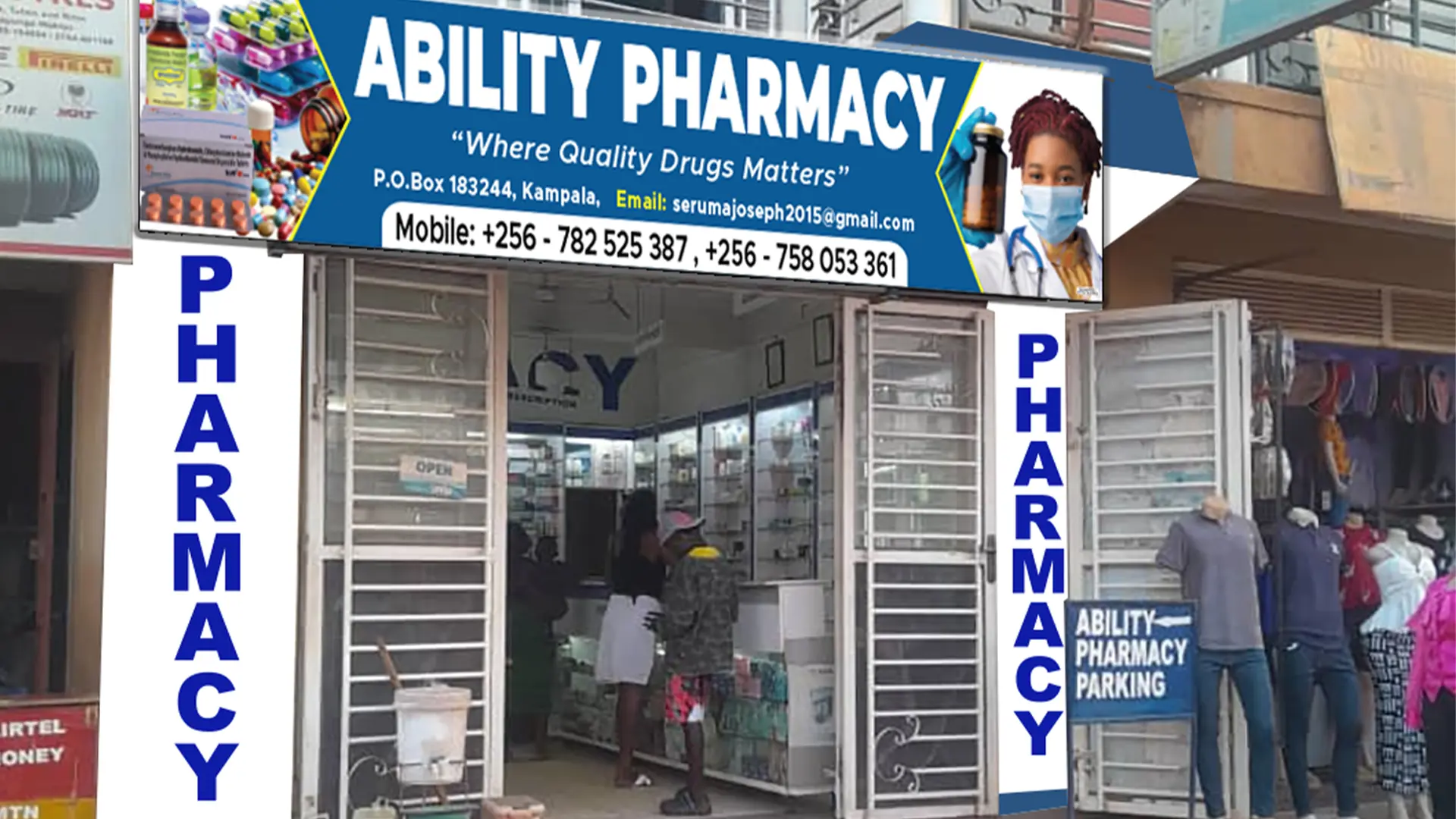 “Retail pharmacy logo design applied on storefront signage in Kampala.