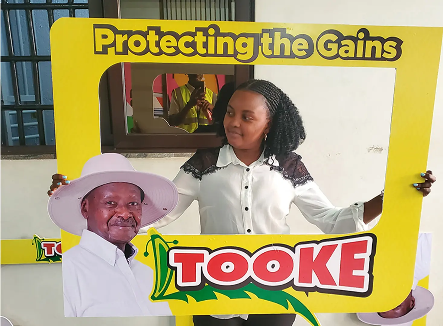 Logo and brand identity applied across exhibition booth setup in Kampala