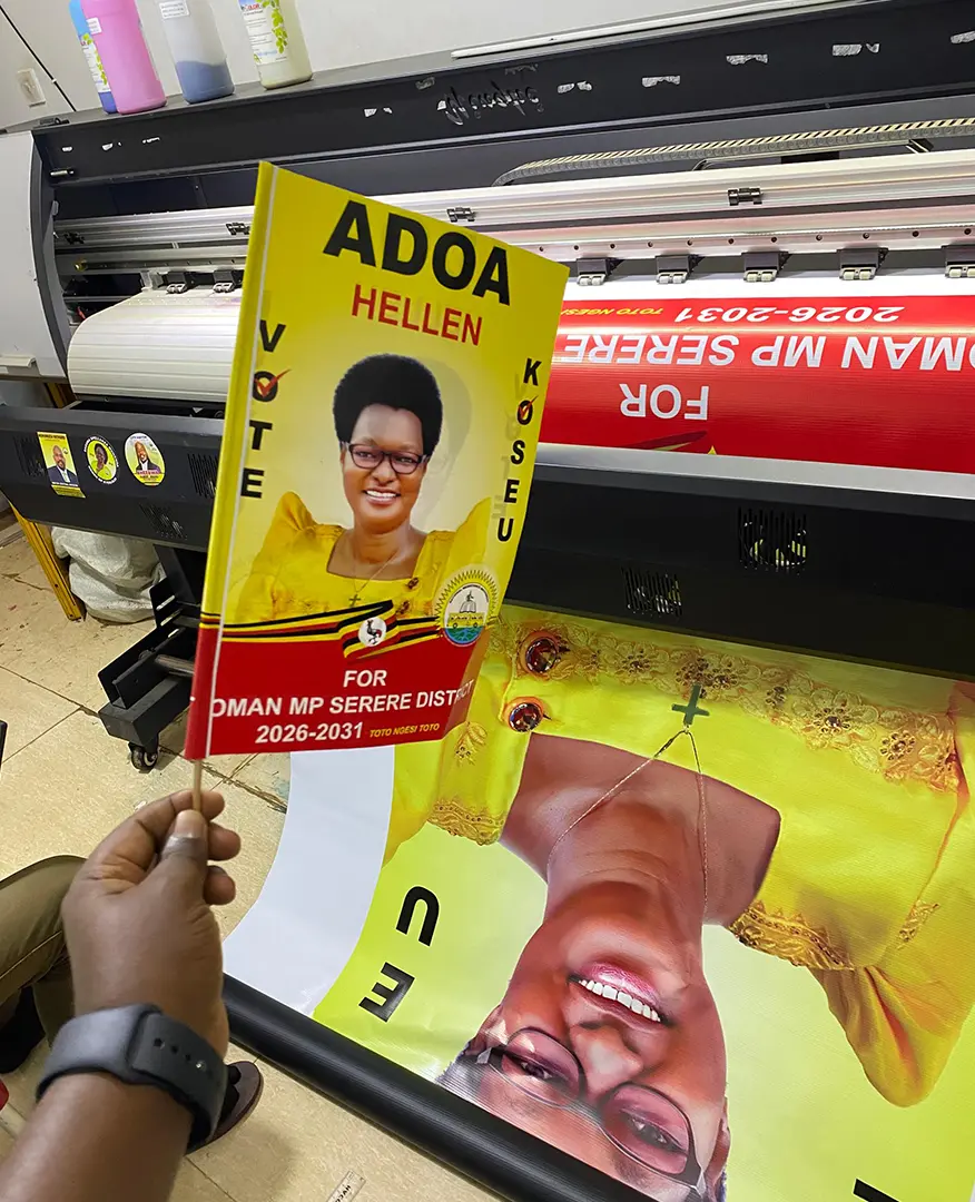 Outdoor PVC banner printing in Kampala with hemming and eyelets.