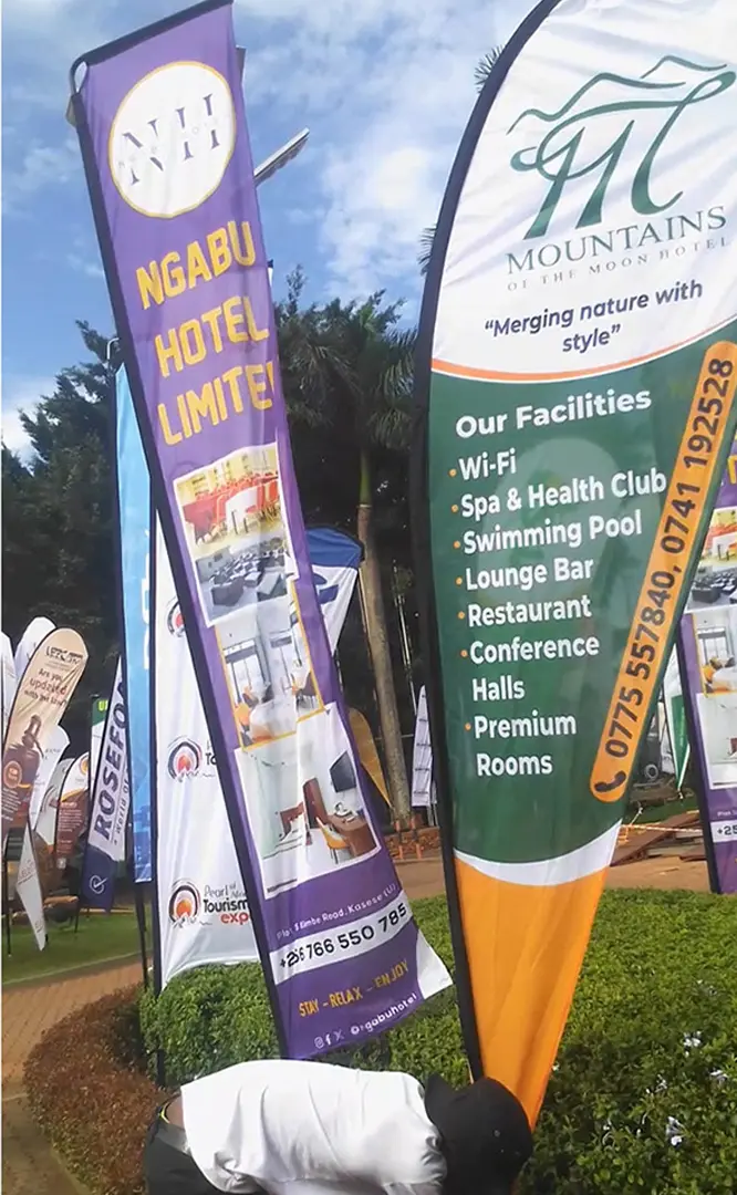 Tear drop banner installation in Kampala for a tourism event promotion.
